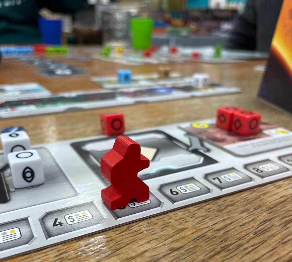 The board game Roll for the Galaxy being played